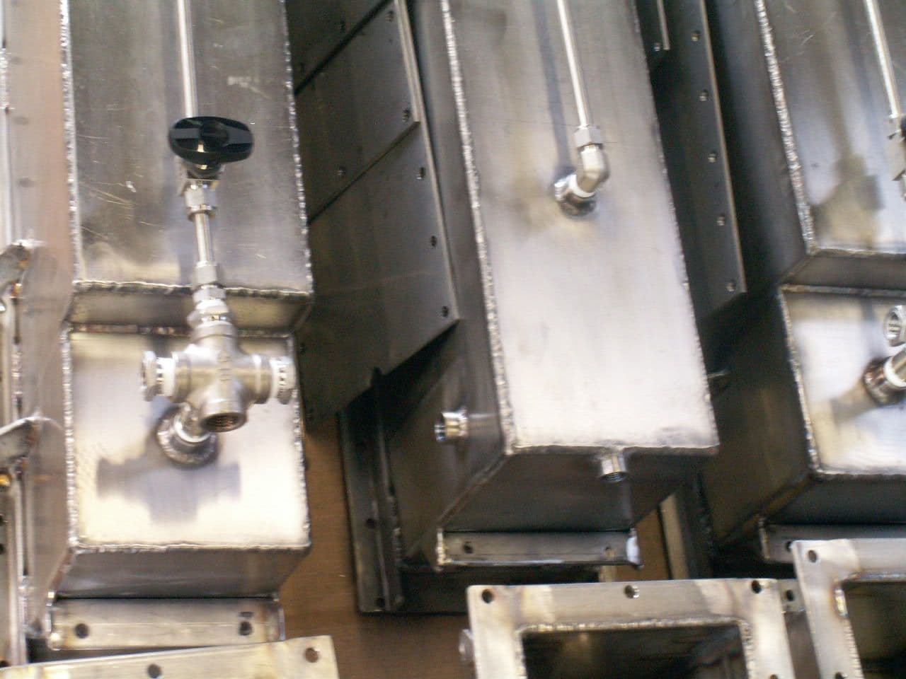 Close-up of stainless steel settler tanks
